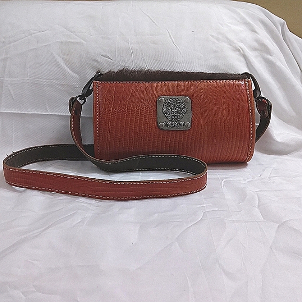Bi - Wallet With A Unique Design Orange Textured Material Brown Fur